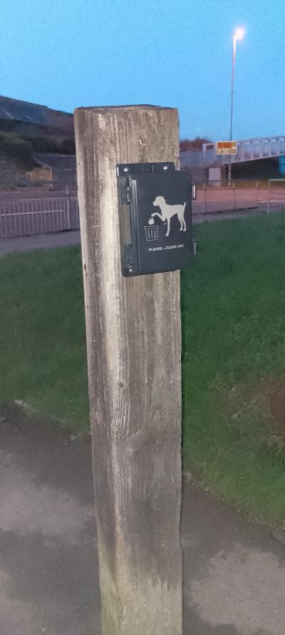 Attention all dog owners! When your dog has done its business, please do yours!